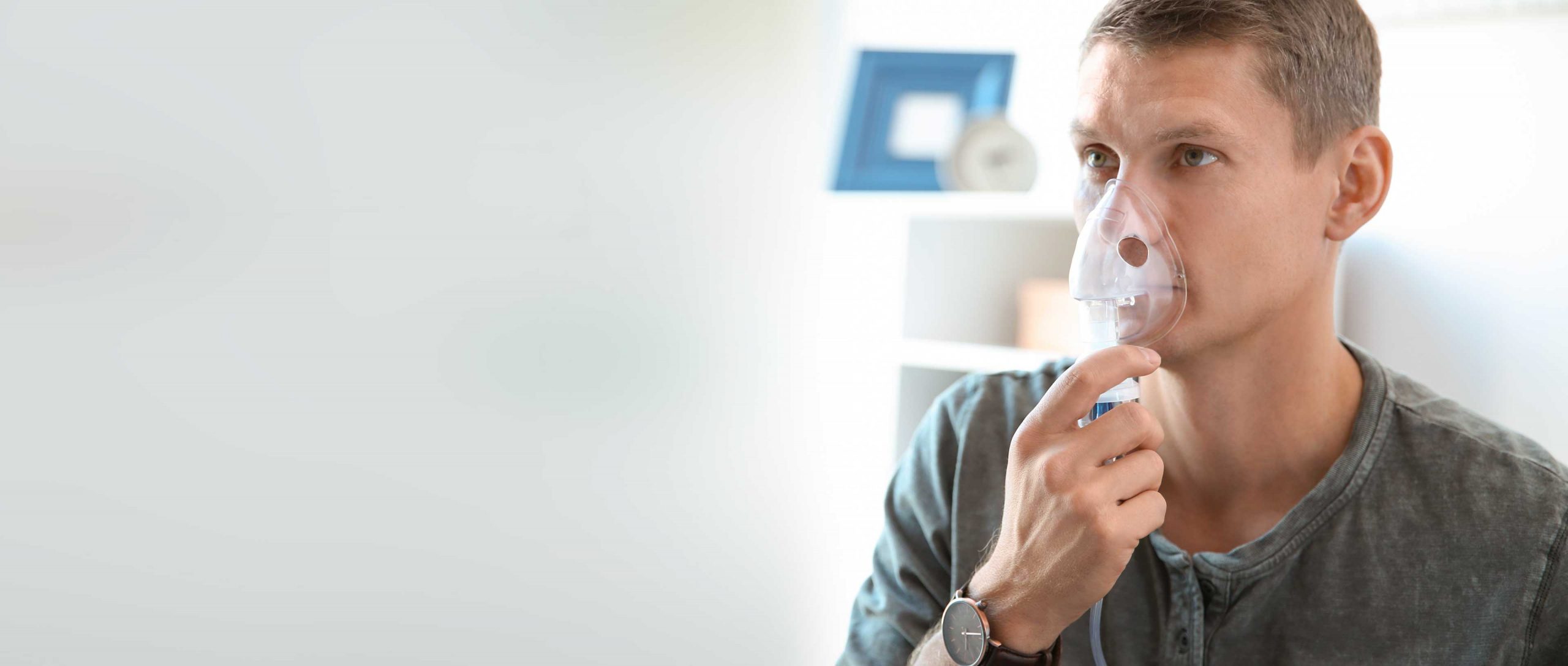 A patient using a nebuliser
